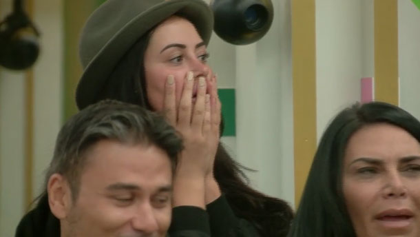  Lewis' girlfriend Marnie Simpson covered her face as she watched