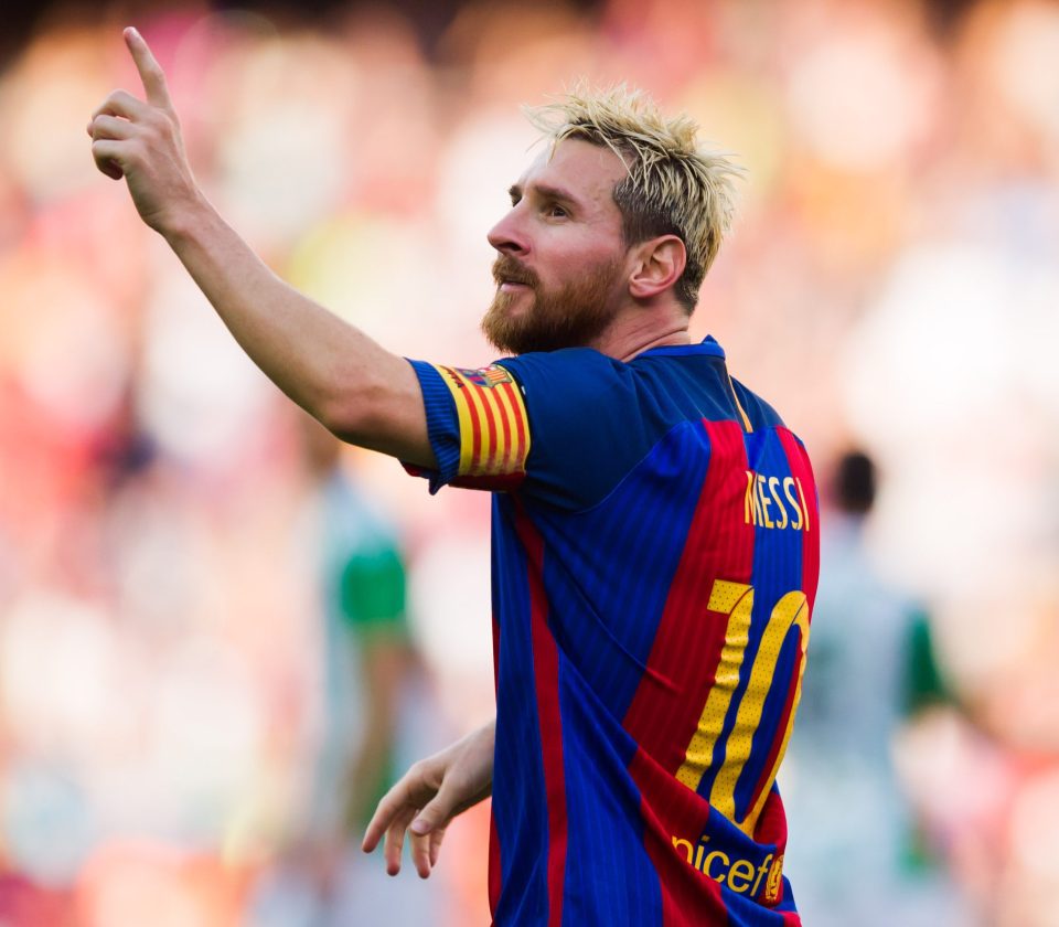  Lionel Messi proved blondes have more fun as he ran riot on Saturday