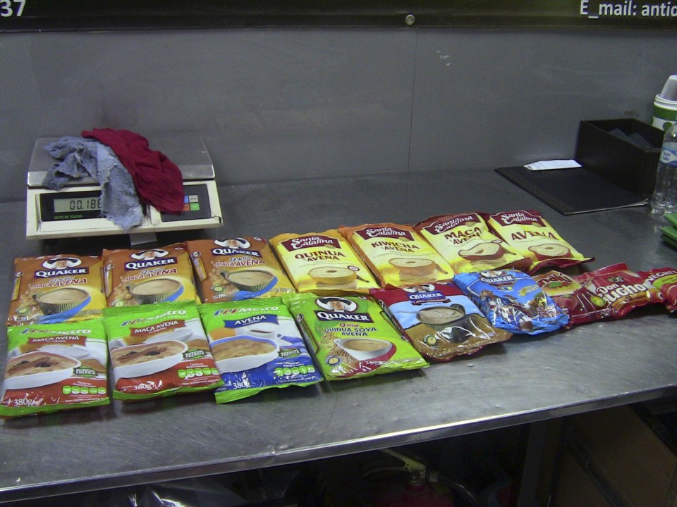 showing food packages seized by police, containing cocaine and found in the luggage of Belfast resident Michaella McCollum Connolly and British citizen Melissa Reid, lay on a table at the airport in Lima