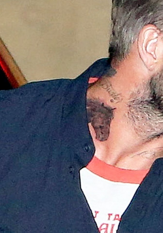  The bizarre new inking sits on his neck just below where he has his nickname for Brooklyn, "Buster", written