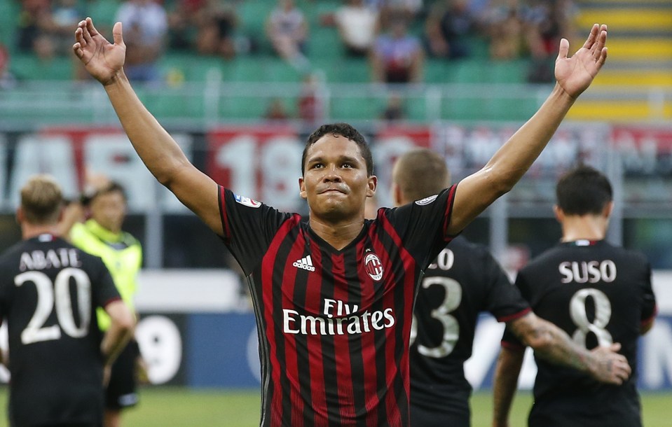  Carlos Bacca netted a hat-trick as Milan won a thriller against Torino at the San Siro