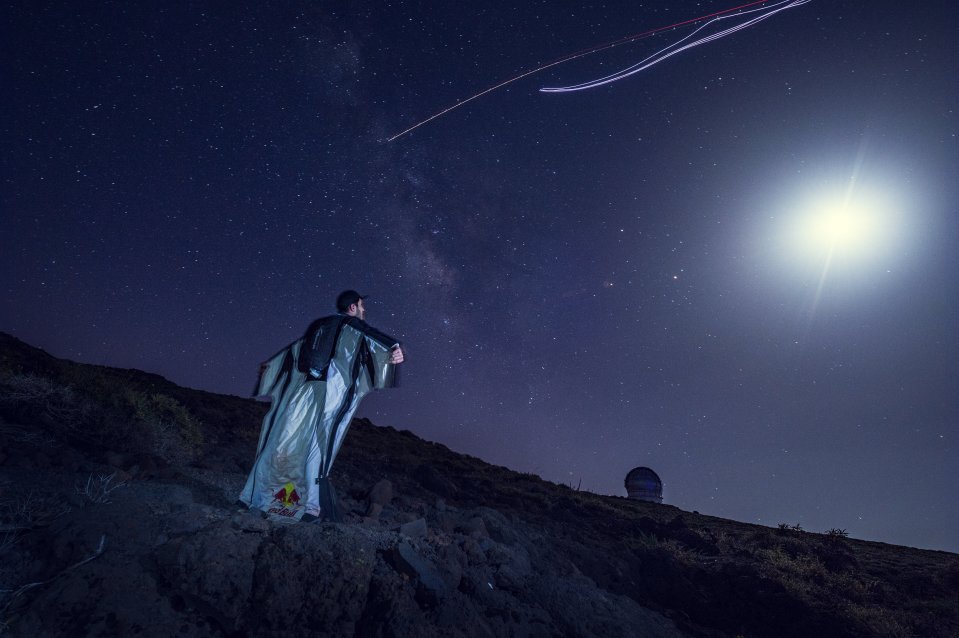  A wingsuit jumper reaches for the stars over La Palma in the Canary islands