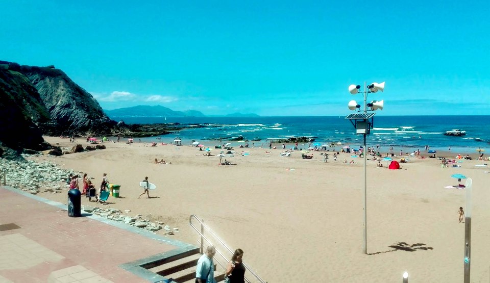  Police hunting a rapist who snatched a British au pair from Arriatera Beach (above) in northern Spain attacking her