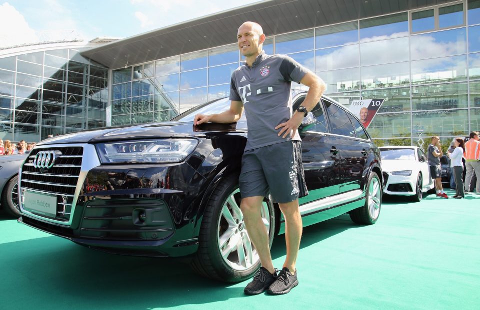  Winger Arjen Robben looked pleased as punch after getting his new Audi