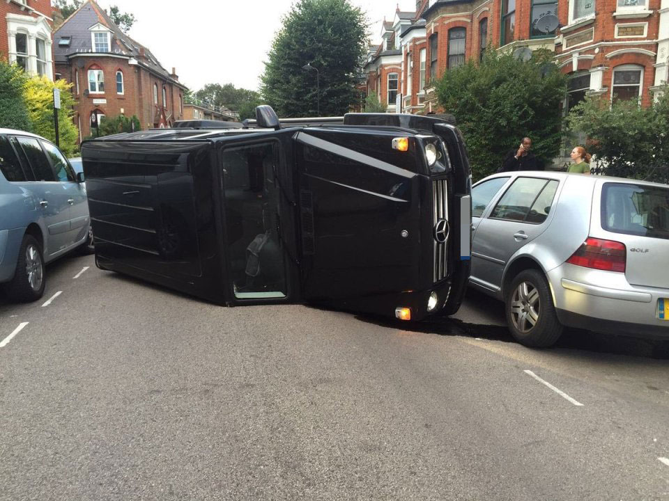  The car remained upside down on the street until the emergency services arrived