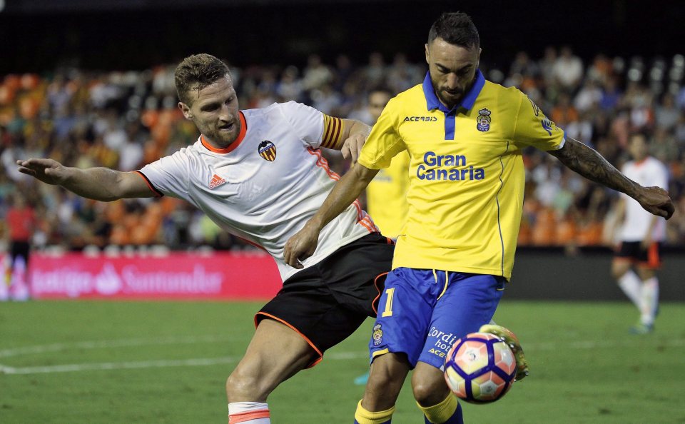  Valencia defender Shkodran Mustafi could arrive on a £35m deal