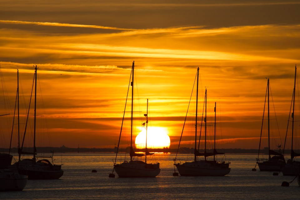  The sun rising over the Thames in Gravesend, Kent, as summer makes a reappearance in the south of England