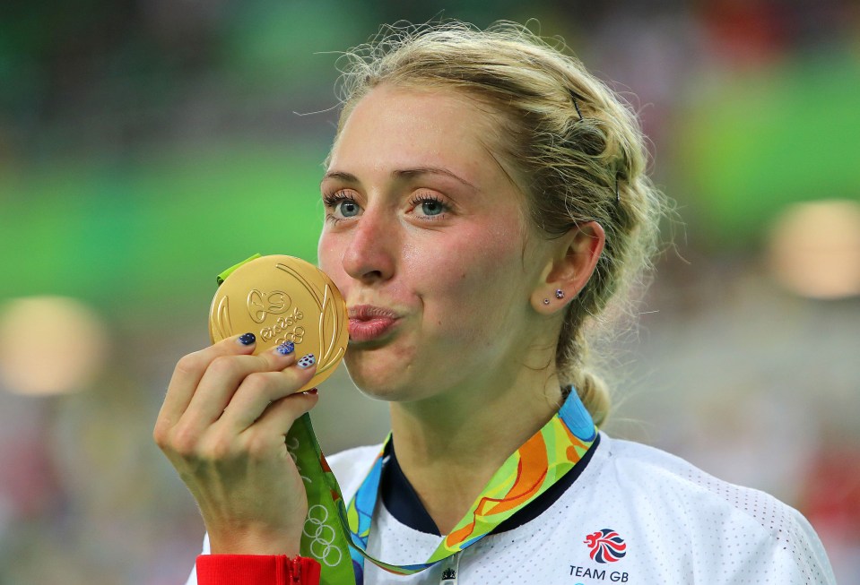  Laura kisses her gold medal after winning the Women's Omnium