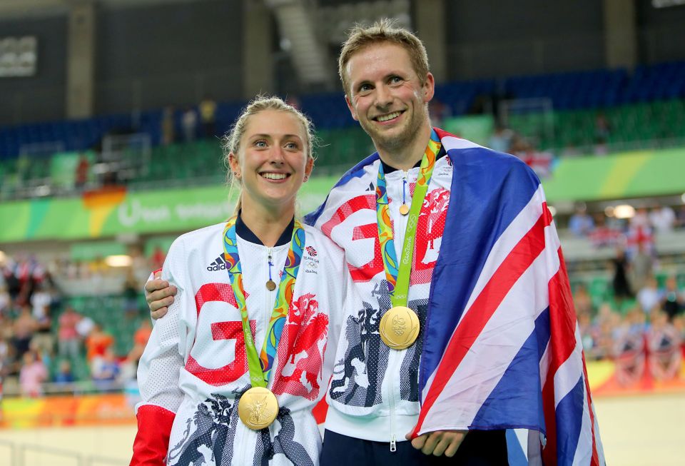  Laura and Jason pose with their gold medals at the Rio Olympics