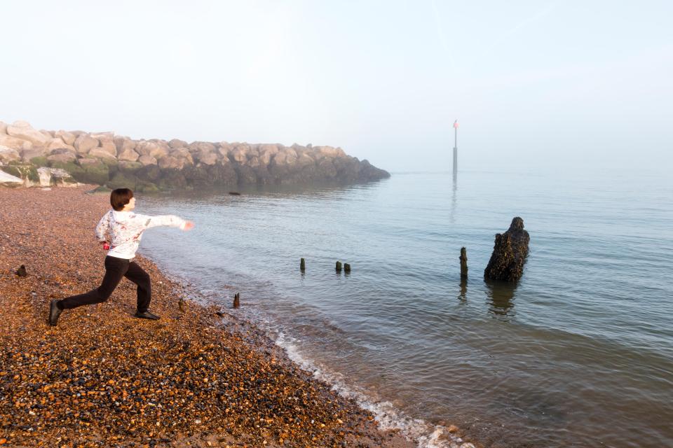  A child enjoys the sunshine in Reculver, Kent, as the mercury nudged a scorching 28C