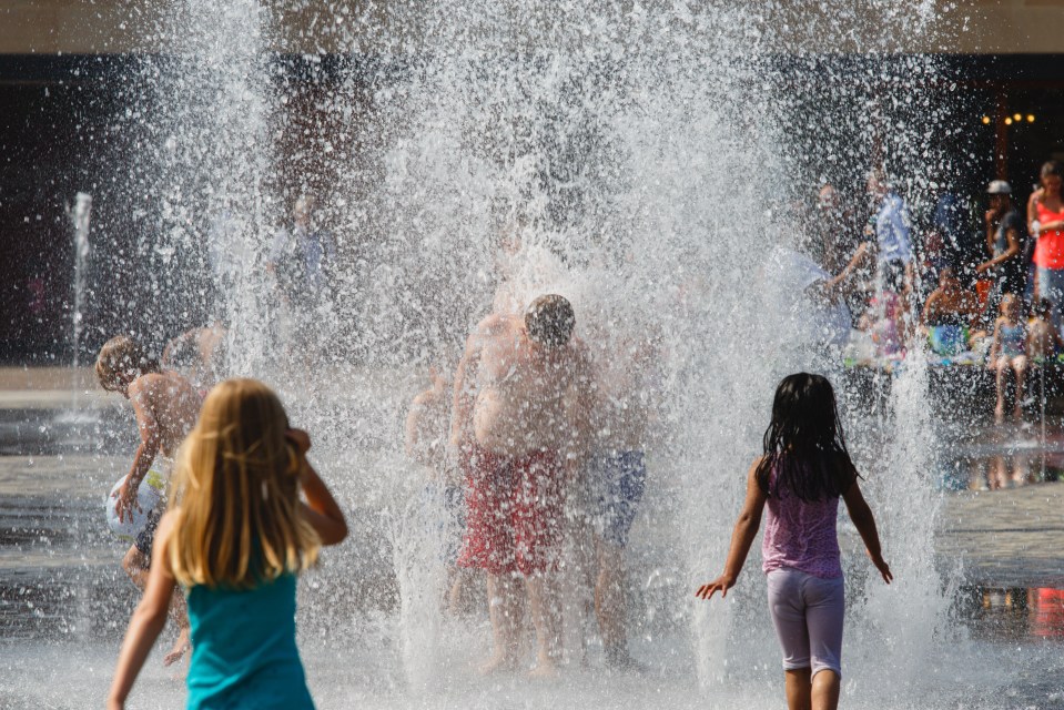  Children in Bradford jumped into fountains as temperatures rose today