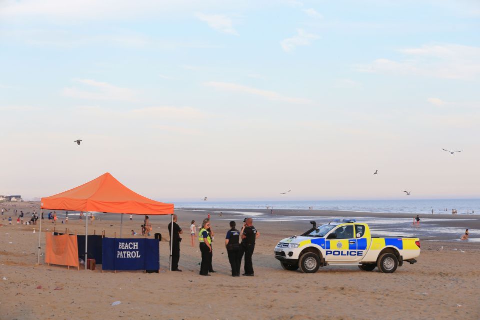  Police forces remain in place at Camber Sands this morning after last night's mystery deaths