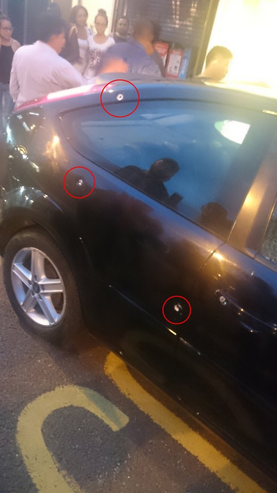  Car damage allegedly caused by the gunfire