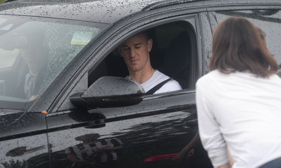 John Stones drives Joe Hart away from the training ground in what could be his last ever training session