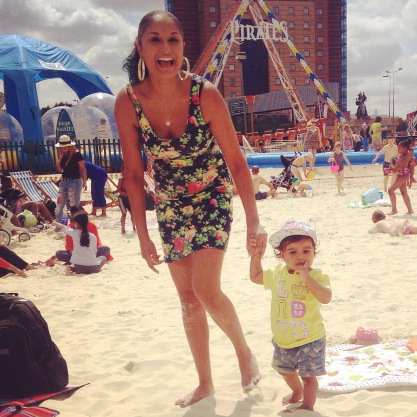  Rose and baby Mya on a beach