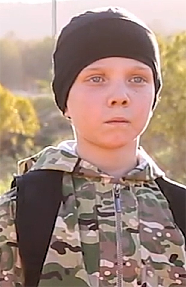  A British child is believed to be one of five children executing prisoners in an ISIS video