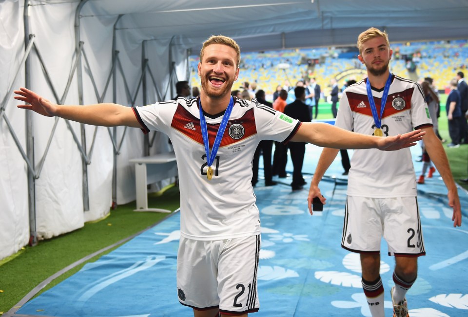  Shkodran Mustafi and Christoph Kramer celebrate after winning the 2014 World Cup