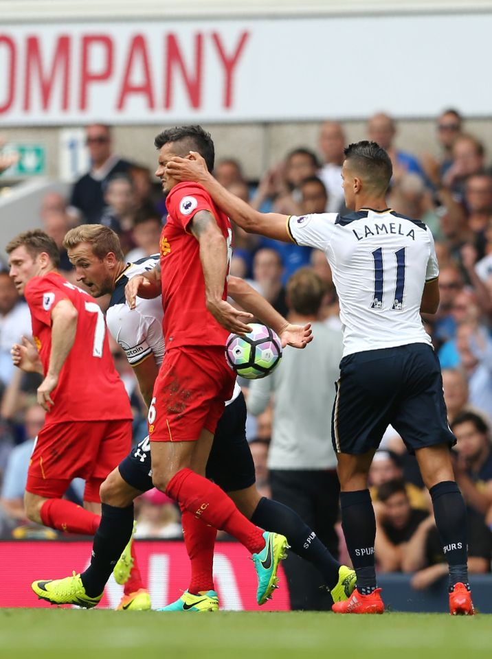  Tottenham forward Erik Lamela somehow avoided a red card for hitting Dejan Lovren