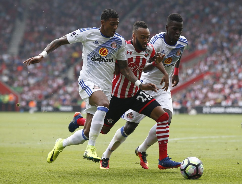  Nathan Redmond battles through Patrick van Aanholt as he trys to break free of the Sunderland defence