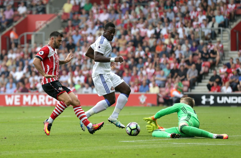 Jordan Pickford rushes down and smothers Charlie Austins attempt 