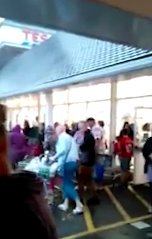 Panic ... Scores of shoppers had to rush out of the Tesco store after it was thought to have been struck by lightning