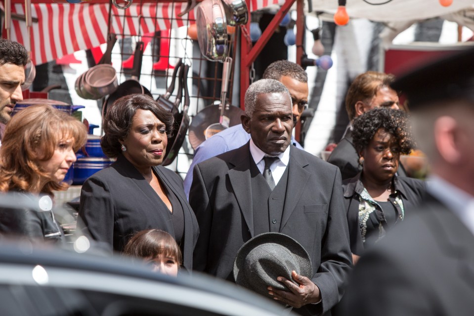  The residents of Albert Square pay their respects at the funeral