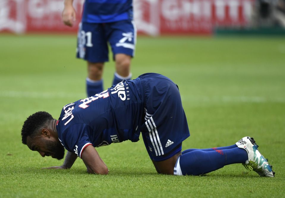  Lyon striker Alexandre Lacazette is injured against Dijon in Ligue 1 match