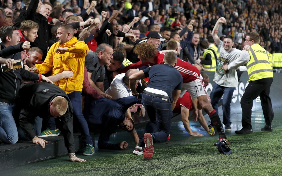  Marouane Fellaini realised Gale, 59, was distressed and caught up in the crowds, and directed stewards towards her