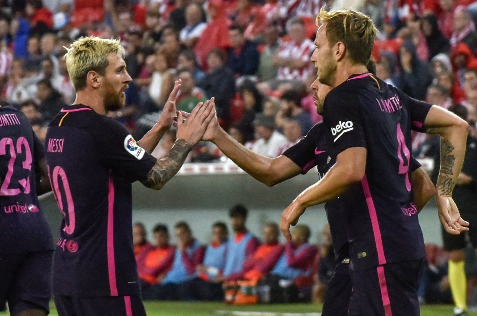  Lionel Messi and Ivan Rakitic celebrated Barcelona's opening goal together