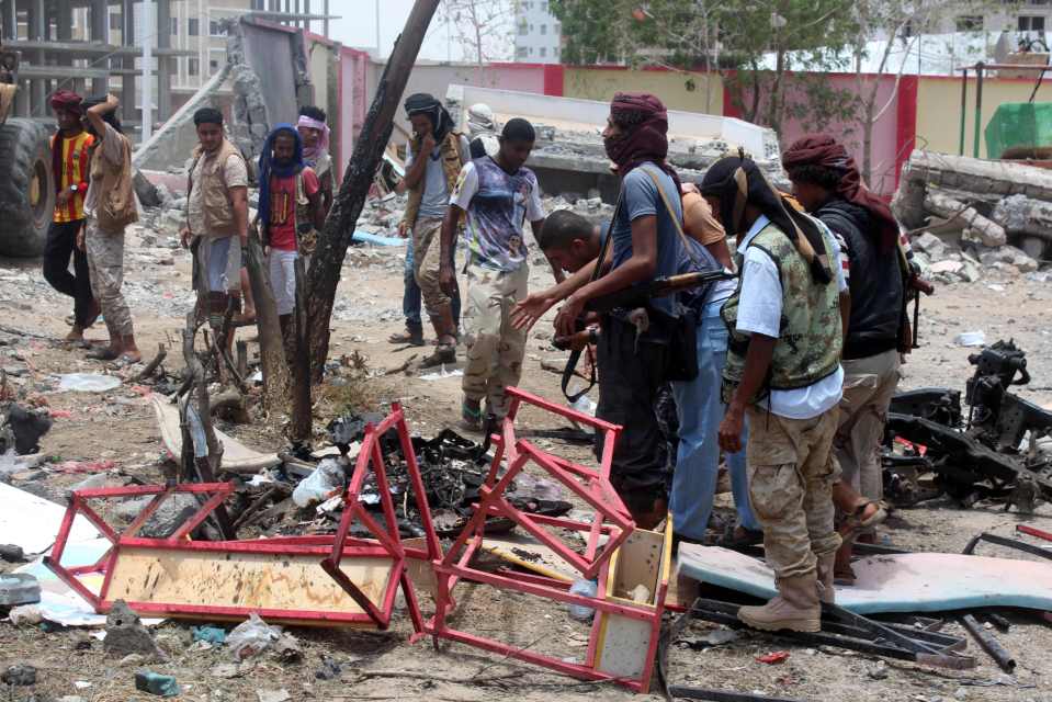  Locals join soldiers in sifting through the wreckage