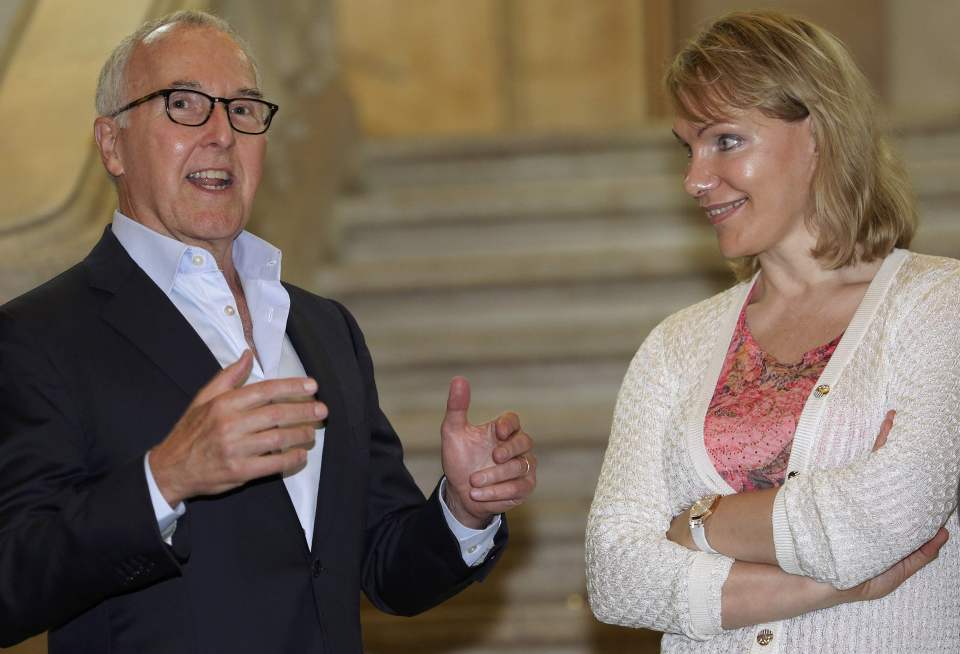 Olympique de Marseille's majority owner Louis-Dreyfus and former owner of the Los Angeles Dodgers baseball team McCourt attend a news conference at Marseille city hall