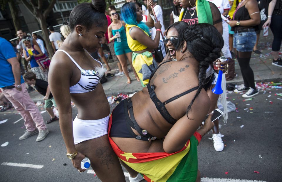  These two women let their hair down as they paraded through the streets of Notting Hill