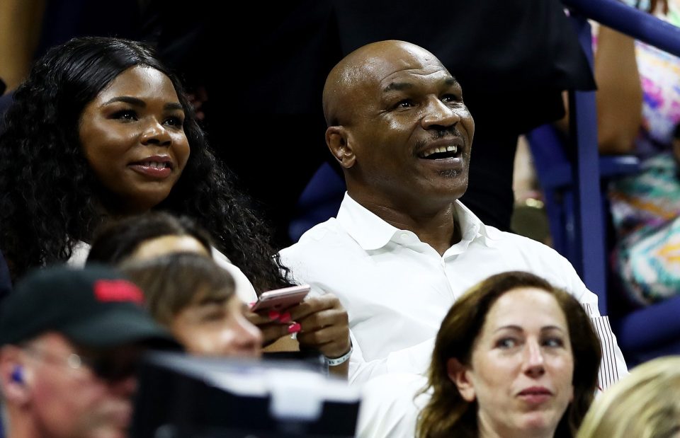 Mike Tyson watched on from the stands at Arthur Ashe Stadium