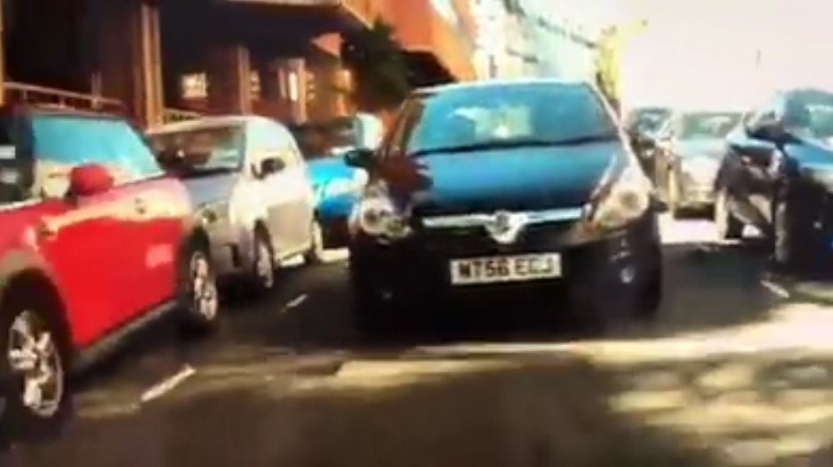  The clip - taken on from a camera mounted on his bike - starts with Vine being tailgated by a black Vauxhall in Kensington, west London