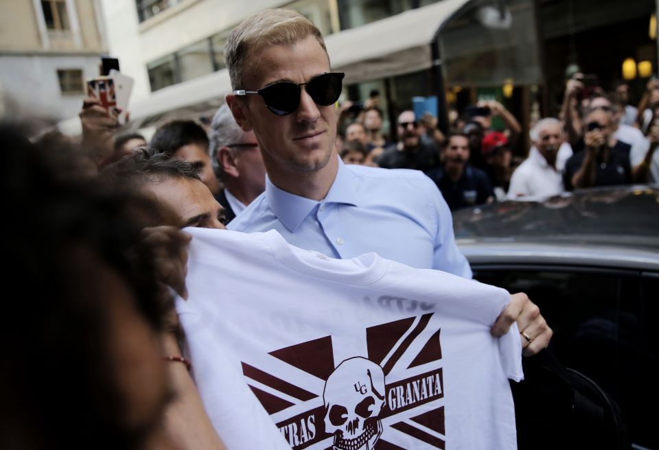  Joe Hart is mobbed by Torino fans as he arrives in the Italian city of Turin