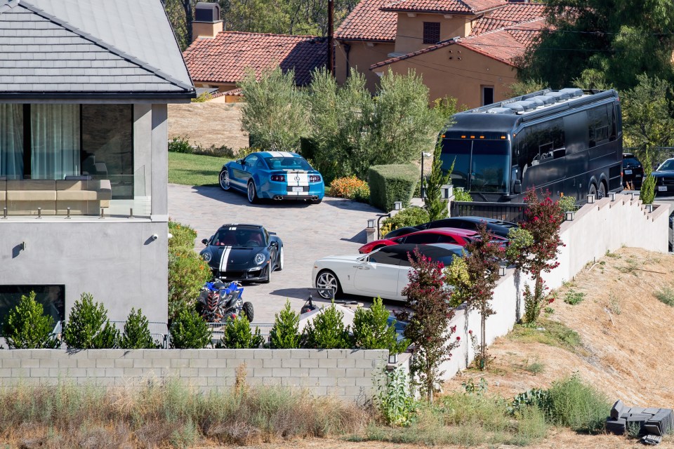 Police gather at Chris Brown's house in Los Angeles, CA