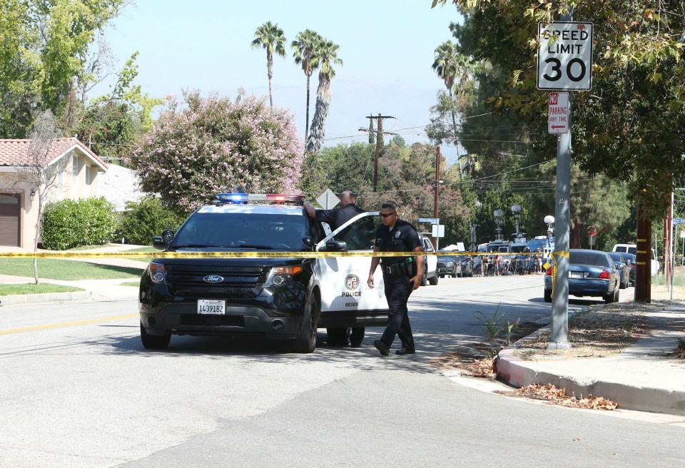 FAMEFLYNET - GV: LAPD Police Units Outside Of Chris Browns Residence In Los Angeles