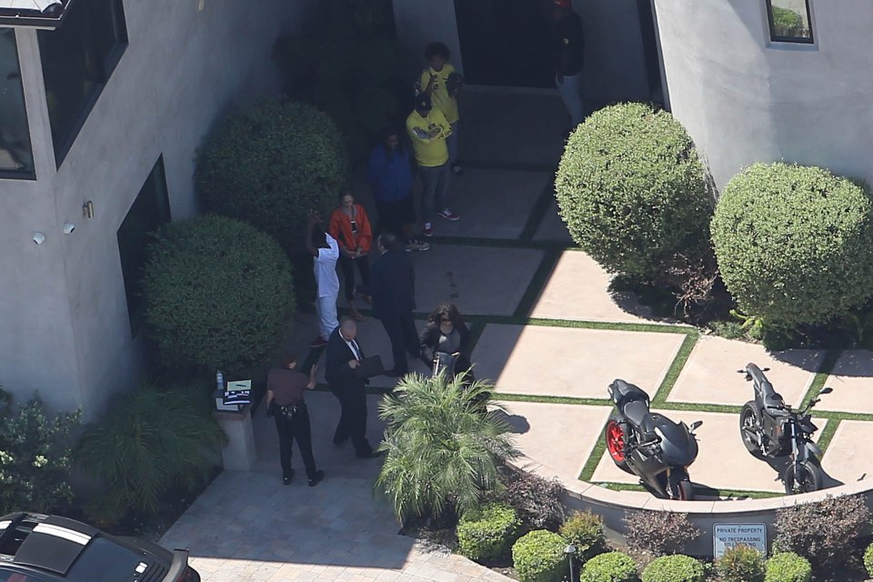 LAPD detain Chris Brown's Friends outside his home for Questioning