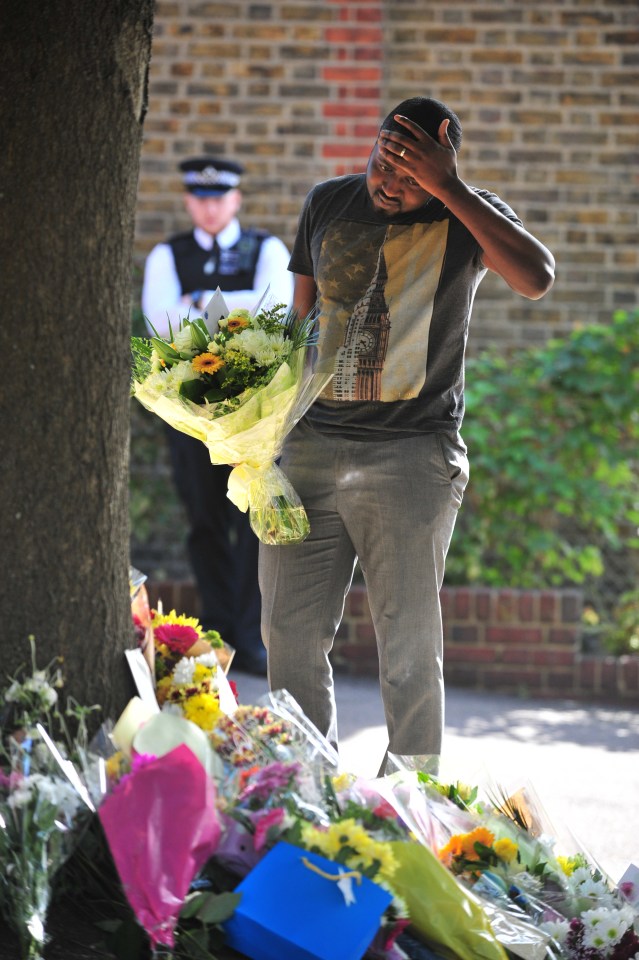  A man looks on in disbelief at the scene