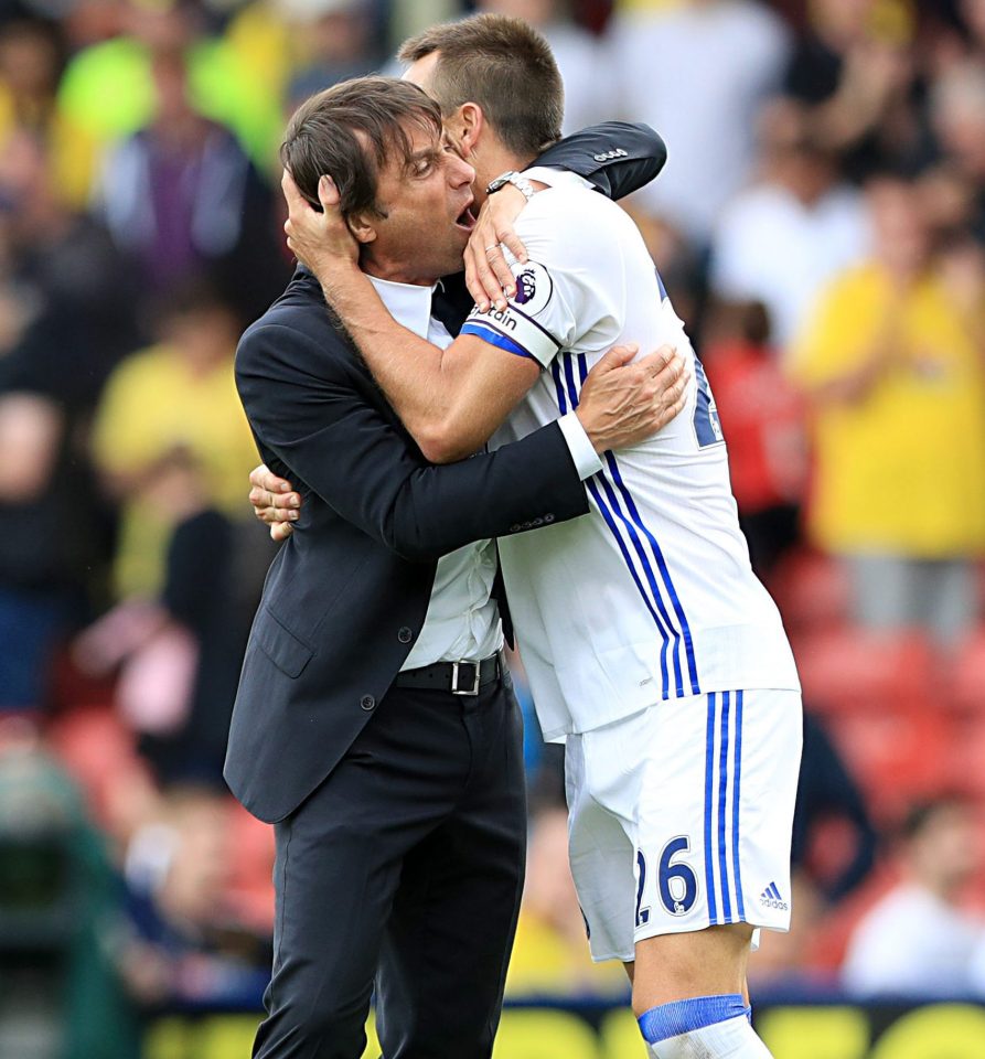  Antonio Conte embraces his captain after picking up a second successive Premier League win