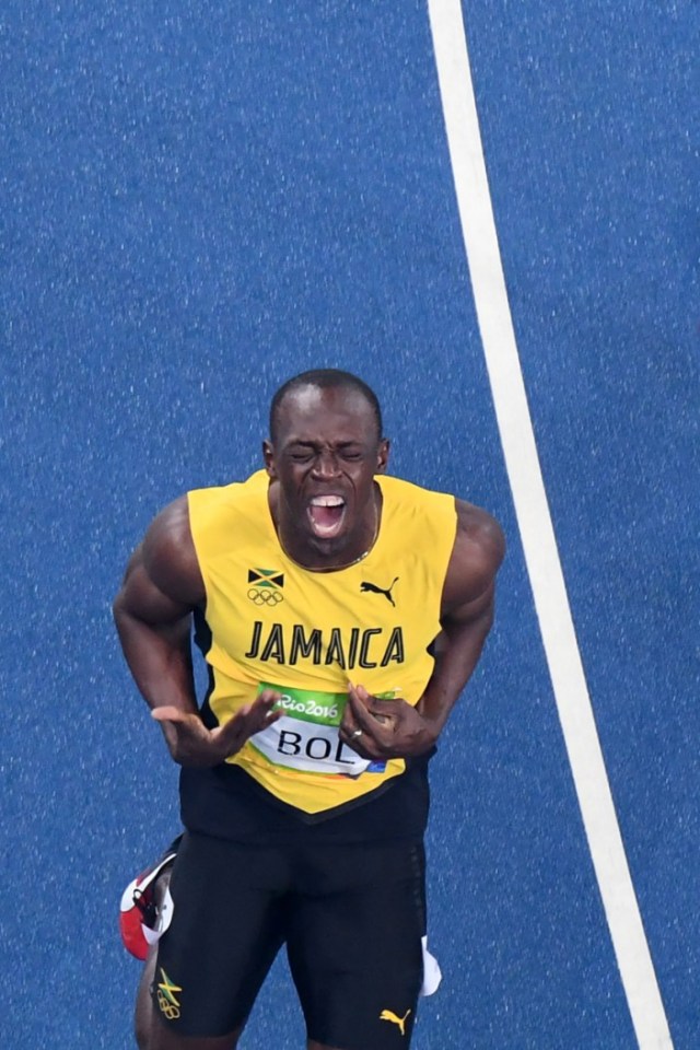 Jamaica's Usain Bolt celebrates after he won the Men's 200m Final during the athletics event at the Rio 2016 Olympic Games at the Olympic Stadium in Rio de Janeiro on August 18, 2016. / AFP PHOTO / Antonin THUILLIERANTONIN THUILLIER/AFP/Getty Images