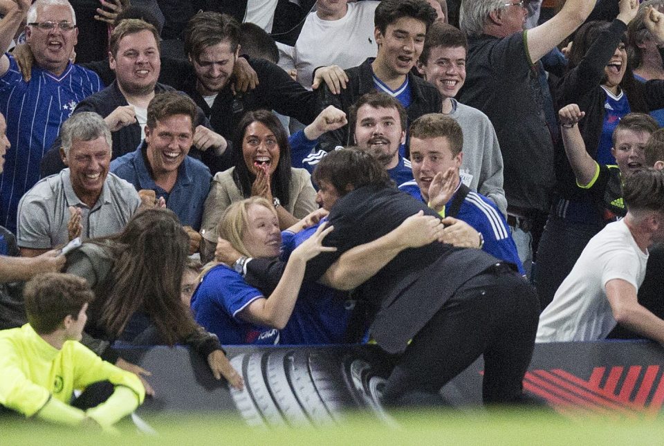  Antonio Conte dives into the crowd after Cheslea score their winner against West Ham