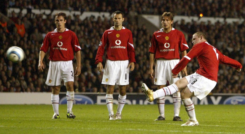  Senior Manchester United players watch on as Wayne Rooney scores from free-kick