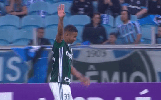  Gabriel Jesus signals to the bench he is in pain after hurting groin in heavy challenge