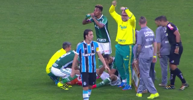  Palmeiras physio calls for a stretcher as Gabriel Jesus holds groin on ground