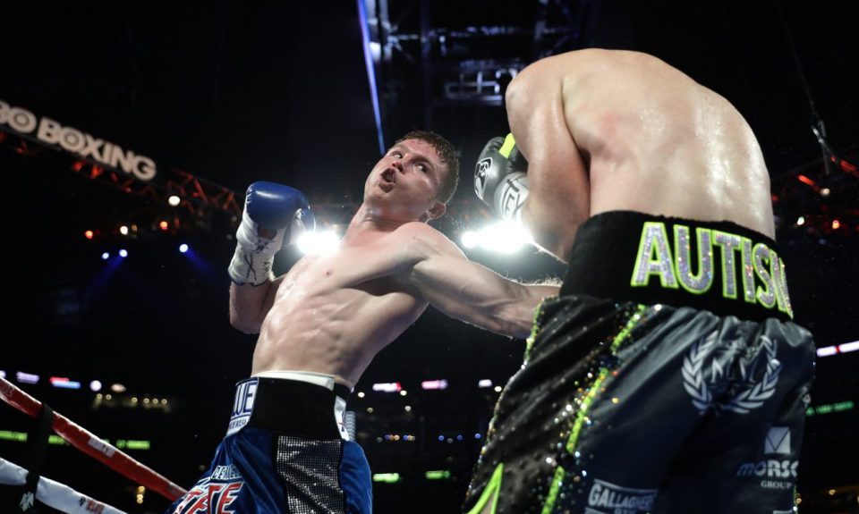 ARLINGTON, TX - SEPTEMBER 17: Canelo Alvarez, left, fights with Liam Smith, right, during the WBO Junior Middleweight World fight at AT&T Stadium on September 17, 2016 in Arlington, Texas. (Photo by Ronald Martinez/Getty Images)