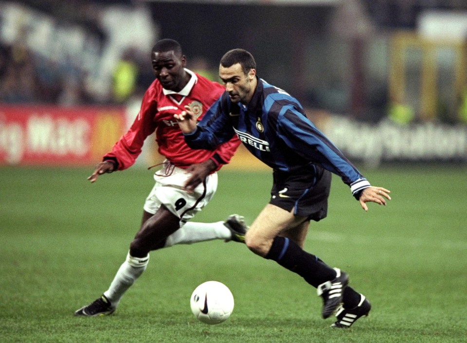  A 36-year-old Giuseppe Bergomi battles with Manchester United's Andrew Cole