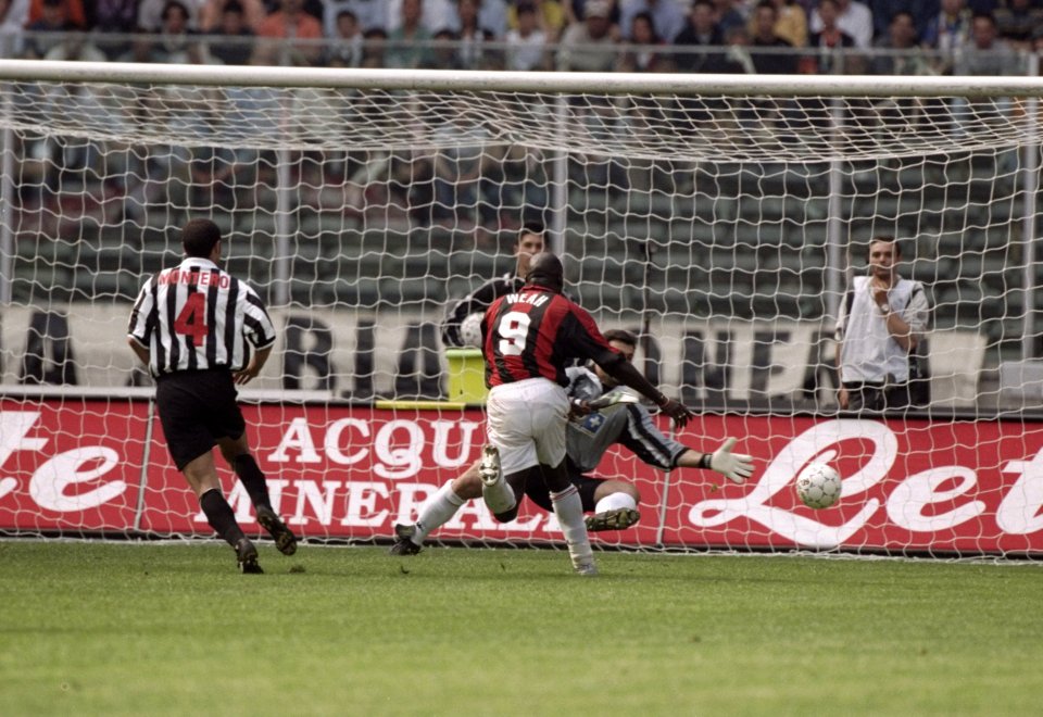  George Weah scores for AC Milan during a 1998-99 Serie A clash with Juventus