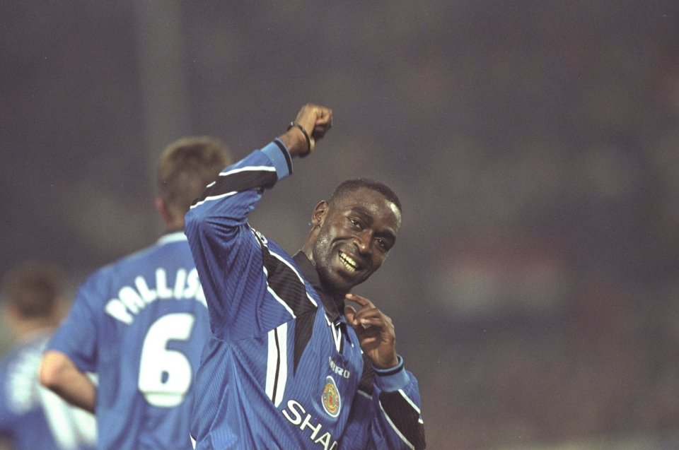 5 Nov 1997: Andy Cole of Manchester United celebrates his goal during the UEFA Champions League match against Feyenoord at the De Kuip Stadium in Rotterdam, Holland. United won 3-1. Mandatory Credit: Phil Cole /Allsport