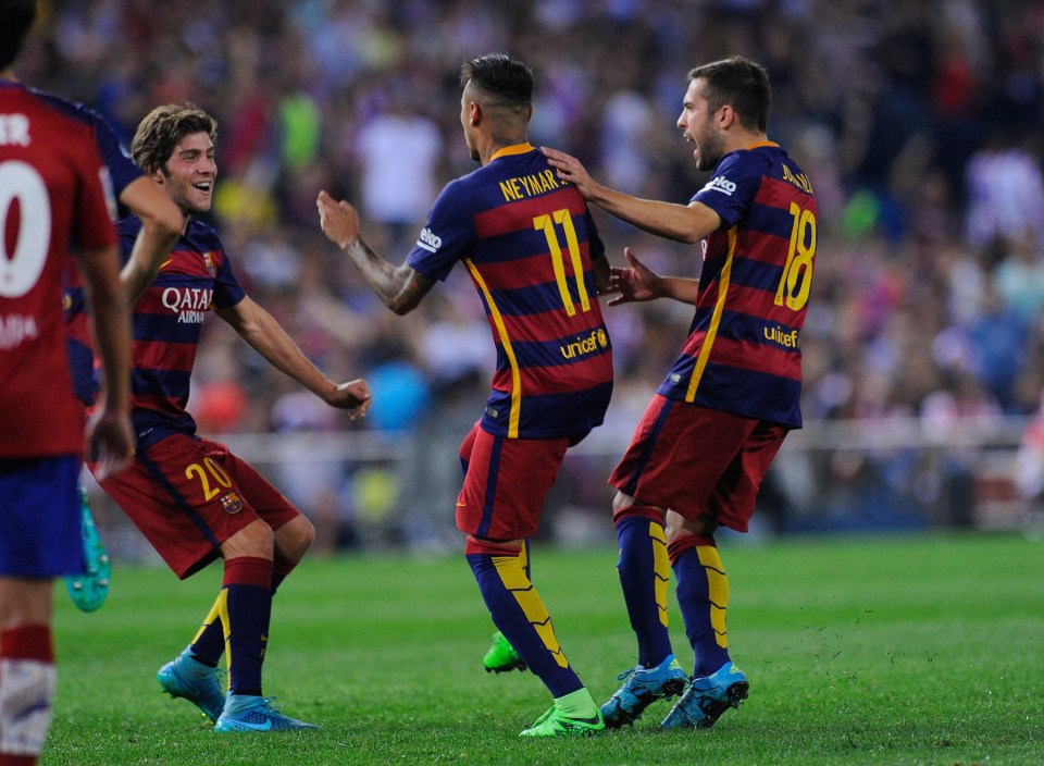  Neymar celebrates scoring Barcelona's opener in 2-1 victory over Atletico Madrid